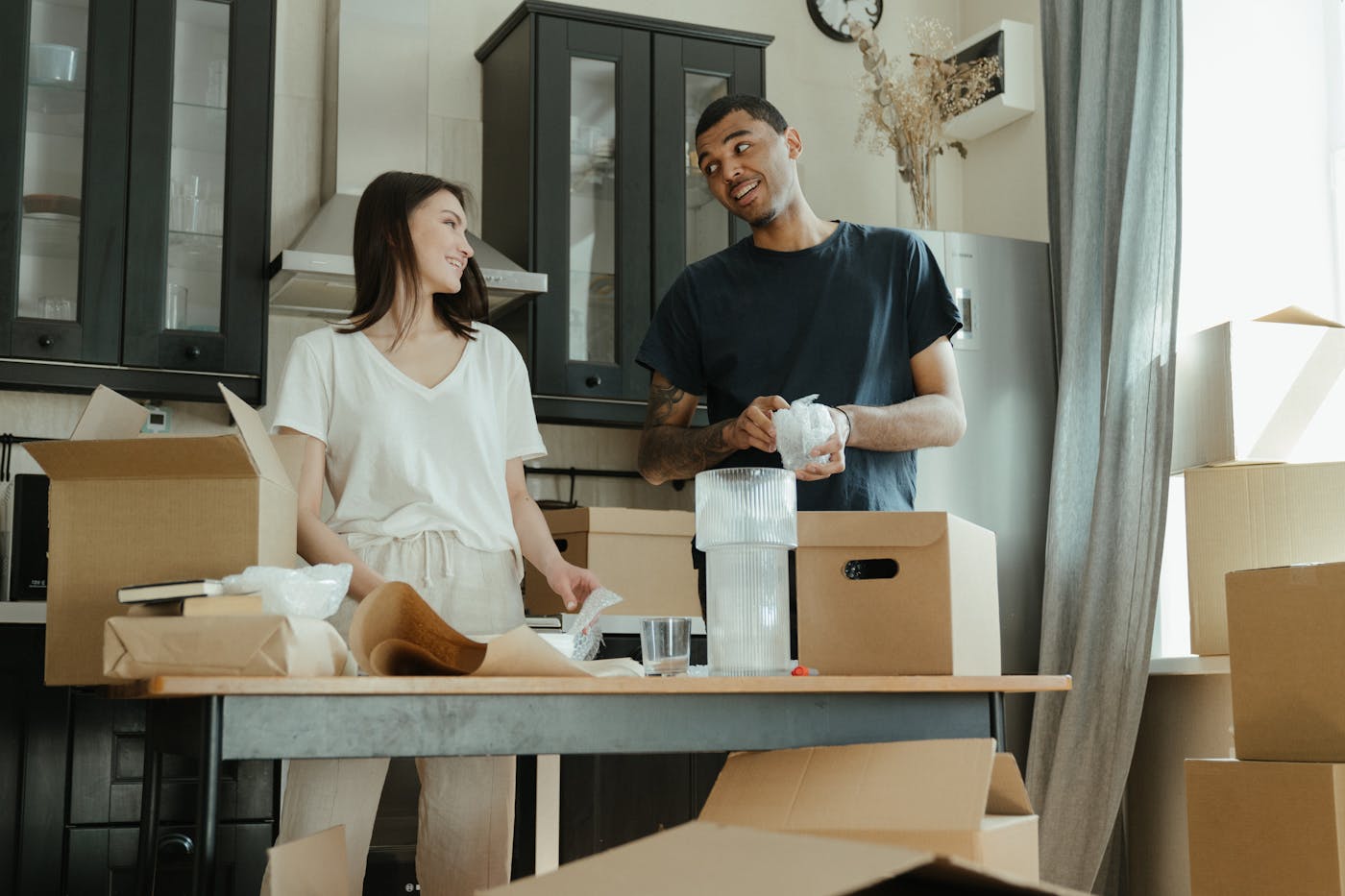 Low Cost Quality Movers crew wrapping furniture for a Phoenix apartment move