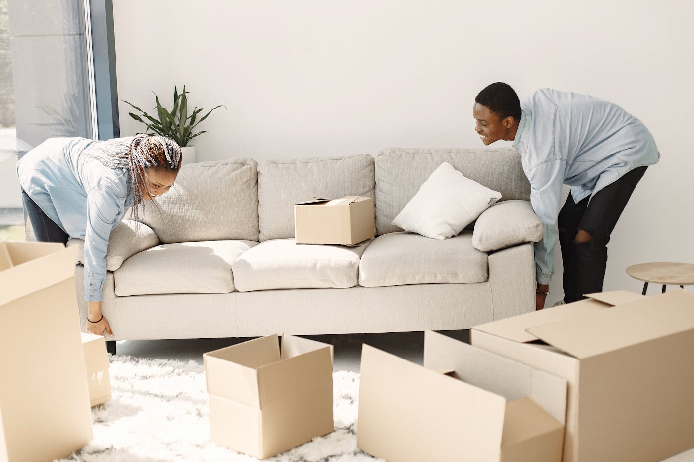 Low Cost Quality Movers crew loading a single-story home in Mesa