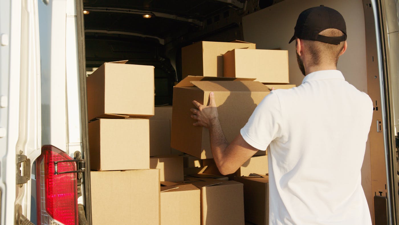 Low Cost Quality Movers truck in a Chandler master-planned neighborhood near Price Road
